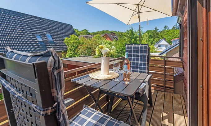 Malente Apartamento | Summer breeze vacation apartment with balcony in Haus Hüttmann in Bad Malente