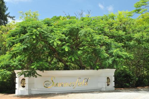 Matsapha Complejo | Summerfield Botanical Garden & Exclusive Resort