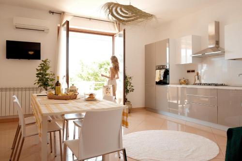 Gioiosa Marea Apartamento | Sun-Filled Apartment, Breathtaking Coastal View, Gioiosa Marea, Limone by Ideal Sicily