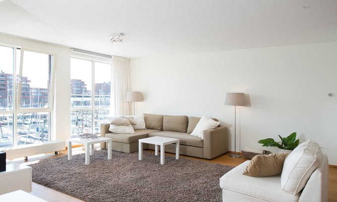 Vissershaven Apartamento | Retiro soleado con balcón