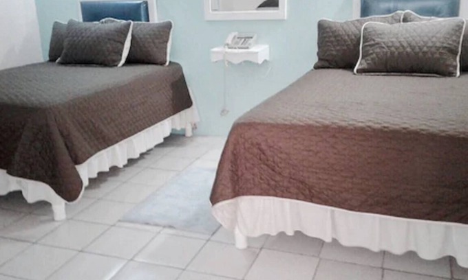 New Kingston Hotel | Sunset Inn Hotel