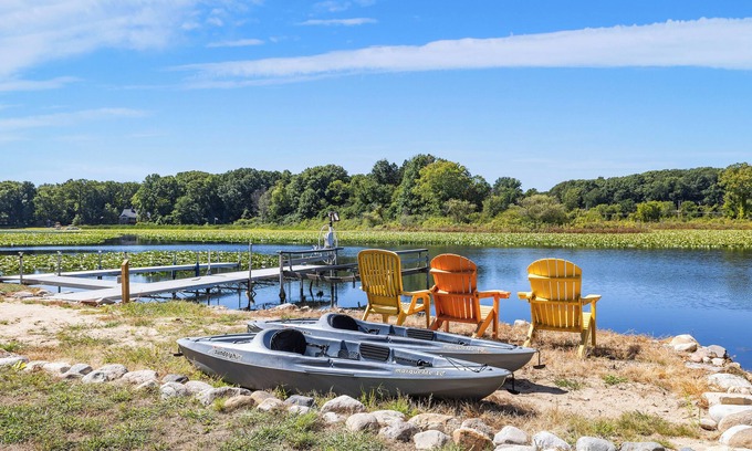 La Porte Casa | Sunset Shores - Lakefront Home with Hot Tub and Fire Pit