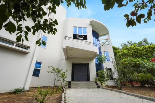 Sulerikadu Hotel | Super Hotel O ECR Stays Near Nemmeli Beach Formerly GVS Homes