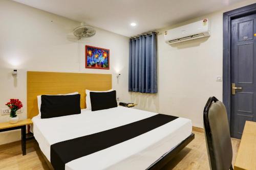 Chromepet Hotel | Super Hotel O Near Uttam Nagar East Metro