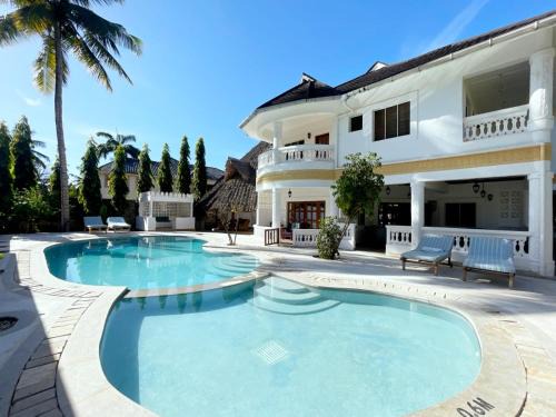 Galu Beach Cama Y Desayuno | Tahira Villa