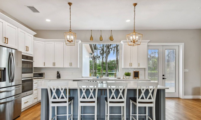 Lutz Otro | Tampa's immaculate private paradise heated pool lake house 1 acre
