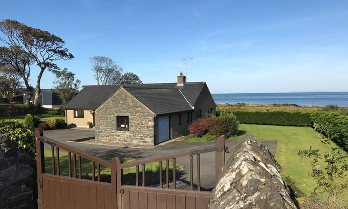 Llwyngwril Cabaña | TAN Y FEDWEN, admite mascotas, con un jardín en Llwyngwril, Ref 996506