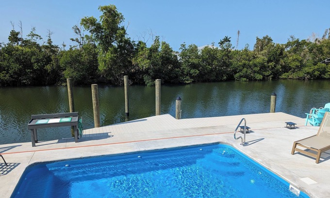 Saint James City Cabaña | Tangerine Dream Tropical Pool and Canal Retreat
