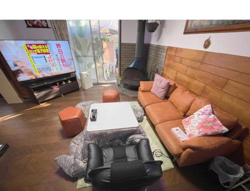 Edogawa Casa | Tatami room & Living Room equipped with Multinational TV and Fire, BBQ corner in Tokyo Downtown House