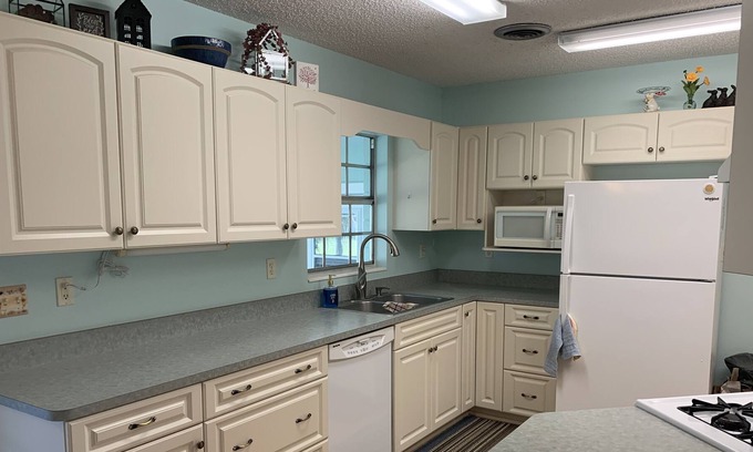 McIntosh Casa | Teal Magnolia en Victorian McIntosh cerca de Ocala y Gainesville