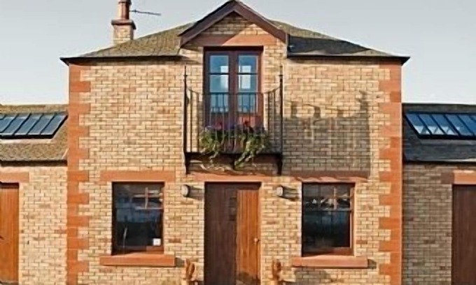 Portpatrick Apartamento | El apartamento está situado en el Muelle Sur en el La mayoría Pintoresco