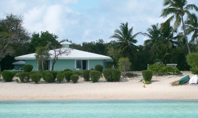 South Palmetto Point Casa | El Barefoot Beach House se encuentra en una playa de arena