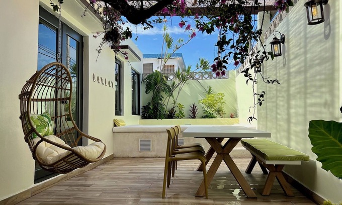 Parque Casa | The Bungalows by HOUS offer a lush tropical paradise perfect for a relaxing getaway.