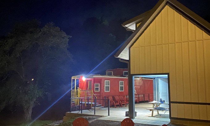 Fayetteville Casa | The C&O Caboose at Cantrell Station, Minutes to Fayetteville!