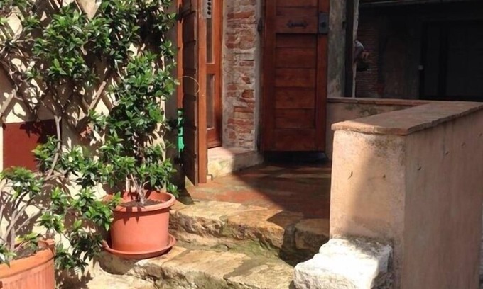 Capalbio Casa | La casa del castillo. Agradable apartamento frente al castillo medieval.