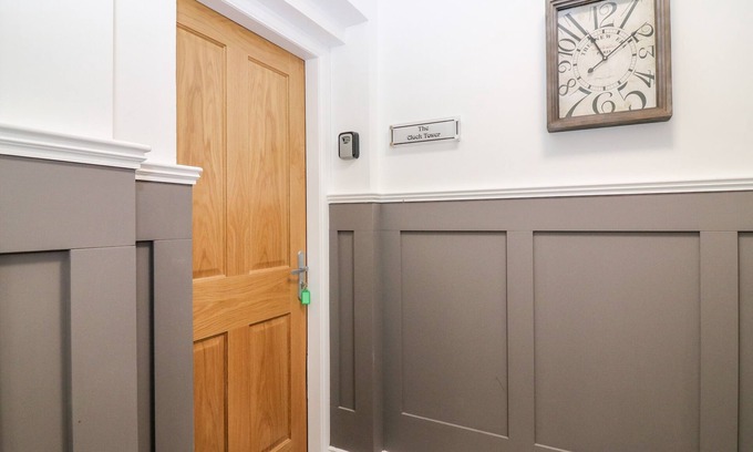 Keith Cabaña | THE CLOCK TOWER AT THE INSTITUTE EXECUTIVE APARTMENTS in Keith
