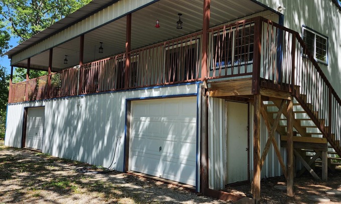 Gober Casa | The home is lakefront, perfect! From the roadside, it's nearly impossible to see