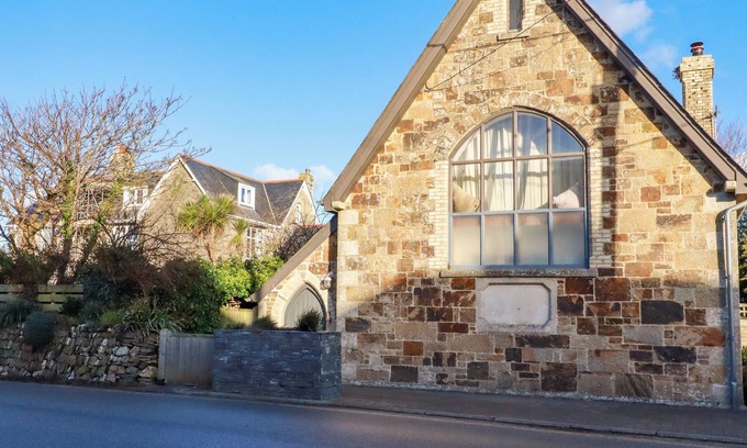 Crantock Cabaña | THE OLD VILLAGE CHAPEL, pet friendly, with open fire in Crantock