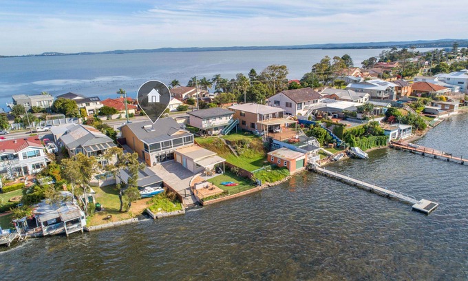 Central Coast Casa | El paseo marítimo absoluto de Toukley Boathouse con su propia rampa para botes