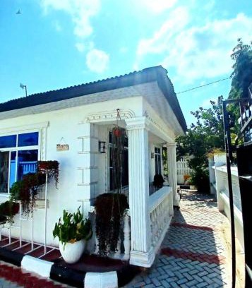 Dodoma Apartamento | The white cottege Apartments
