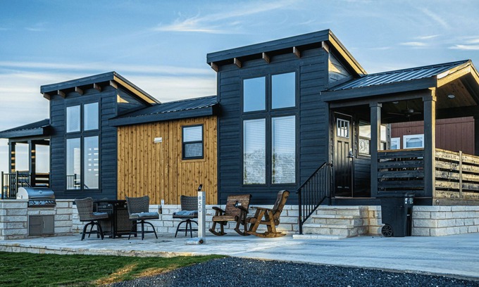 Fredericksburg Cabaña | Black Western-Themed Tiny Home 'The Willie' Offers Luxe Hideout Near Luckenbach's Live Music Scene w