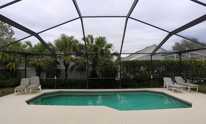 Bridgewater Crossing Casa | This 4/3 Pool Home at Bridgewater Crossing is perfection. Two masters with ensuites, game room, and more!