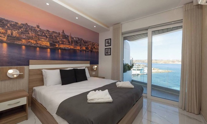 Qawra Apartamento | This apartment is a 2 bedroom(s), 2 bathrooms, located in San Pawl il-Baħar, null.