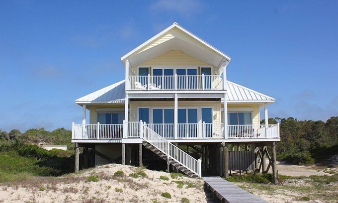 Sea Palm Village Casa | Esta encantadora casa de la isla apareció una vez en Parade of Homes y descubrirá por qué de inmediato.