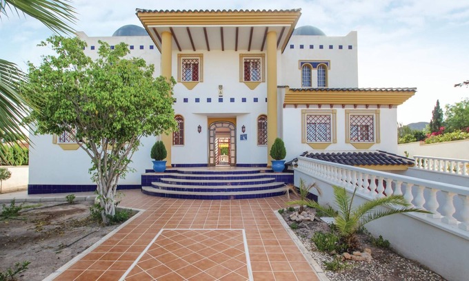 Calabardina Casa | This impressive vacation chalet with capacity for 10 people and private pool was built in Andalusian