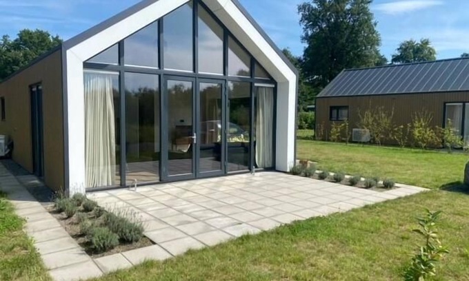 Gasselte Casa | This modern vacation home is the place to be. The house is suitable for four people, has two bedrooms and is completely on one level. Around the house is a spacious garden to relax in the sun.