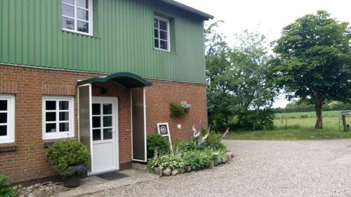 Tarp Casa | Thomsen - familienfreundliche Ferienwohnung mit großem Garten