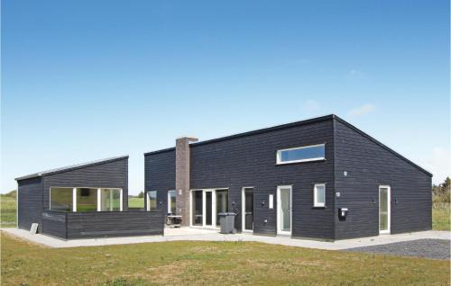 Nørre Lyngby Casa | Three-Bedroom Holiday Home Løkken With A Fireplace 07