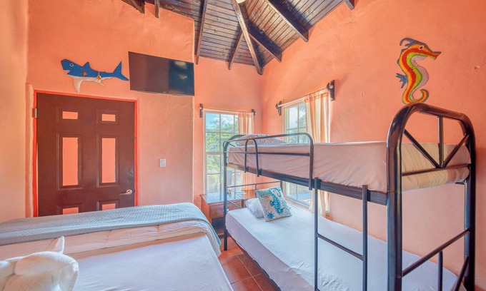 Antoneys Cay Cabina | Three bedroom villa.Two private balconies. One full bathroom and 1 1/2 bath.