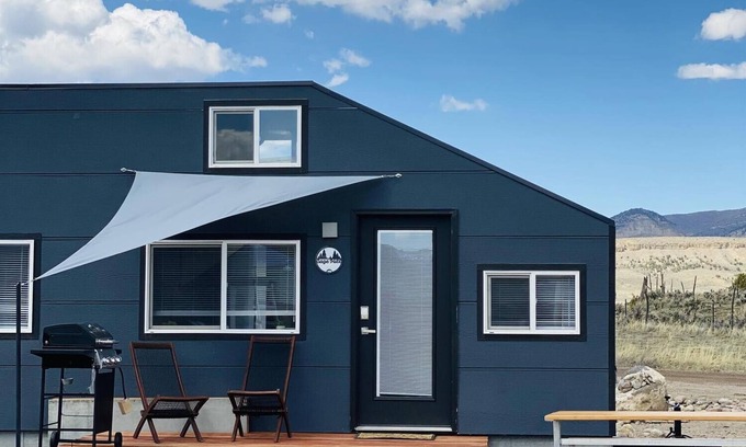 Meeker Casa | Tiny Home built on "Tiny House Nation" with one Queen bed in a loft and twin on main floor. Sleeps: 3