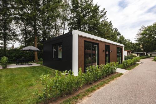 Voorthuizen Chalet De Esquí | Tiny House 'De Dennenhut'