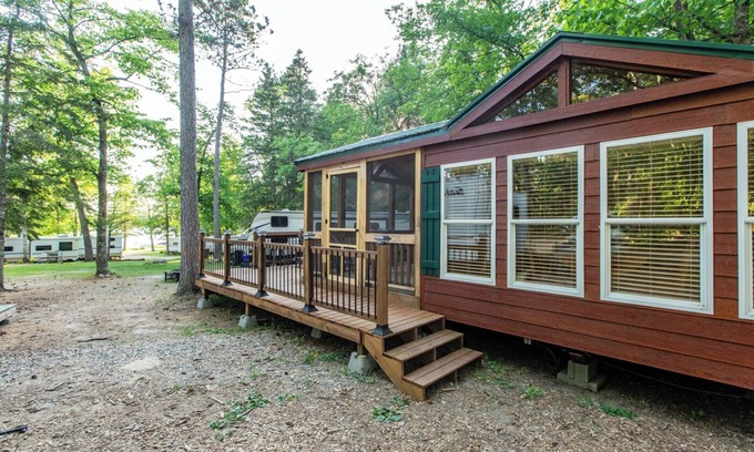 Nevis Casa | Tiny house nestled in the woods with lake view. Pets Accepted!