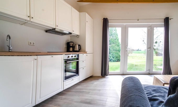 Rabenkirchen-Faulueck Apartamento | Tiny house with its own terrace