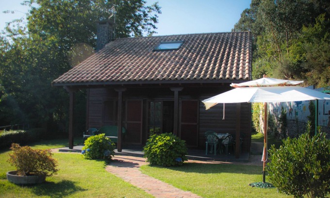 Tomino Casa | Tomino: Casa de madera con jardín, piscina y barbacoa en el 'Baixo Miño'