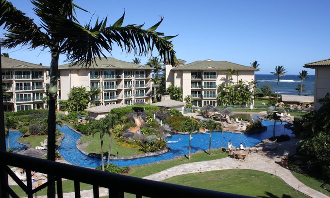 Wailua Condominio | Penthouse en el piso superior con vista al mar y a la piscina 2 camas tamaño king con cama tamaño king