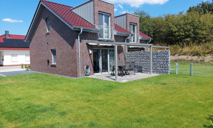 Geeste Apartamento | TOP!!! New build - High-quality and modern DHH, wallbox, electric fireplace, WLAN, close to the lake