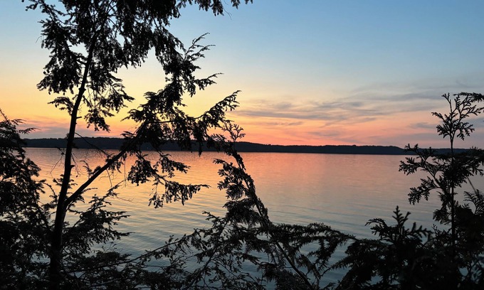 Alden Cabaña | Torch lake waterfront:100 ft of sandy beach, 3-bedroom, 3-bath cottage