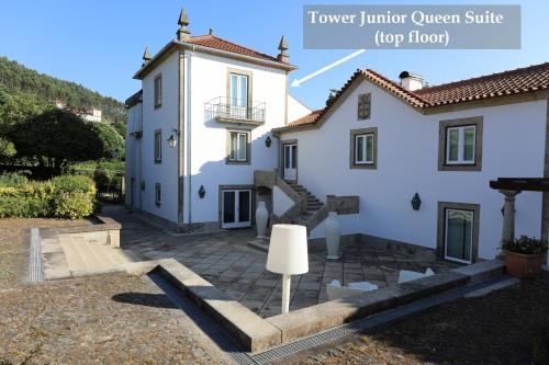 Facha Casa | Tower Junior Queen Suite at Casa dos Macieis, Camino Santiago direct access & Optional Agritourism