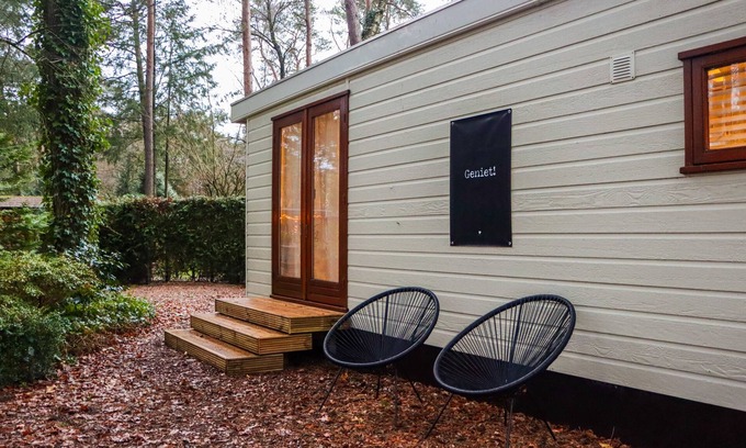 Municipality of Elburg Chalet De Esquí | Tranquil forest chalet by pond in Veluwe, pet-friendly & sleeps 4