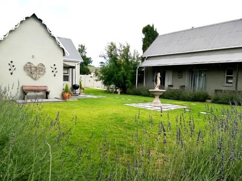 Komani Cama Y Desayuno | Tranquil House B&B @ 1 College Ave