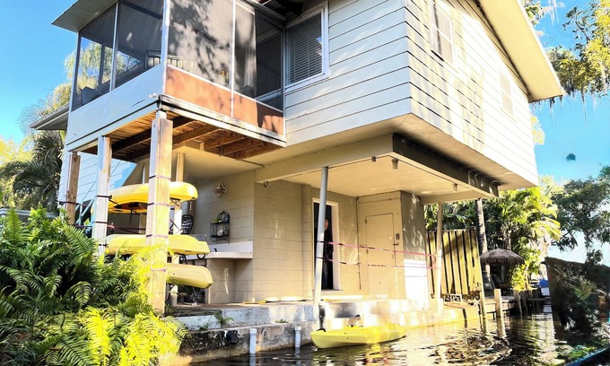 Tarpon Springs Casa | Tree House Treasure - elevated home hovering over the lagoon with 4 kayaks!