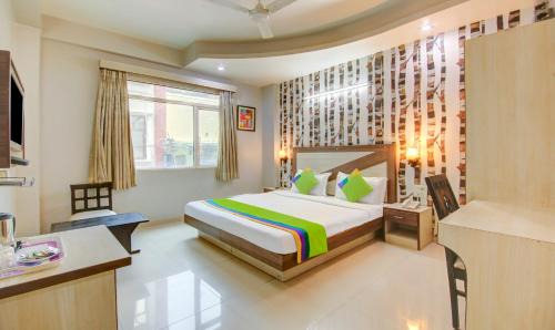 Khattalwada Hotel | Treebo Rockwell Plaza