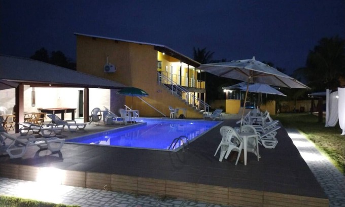 Barra Nova Apartamento | Triple room with air conditioning and hammock on the balcony