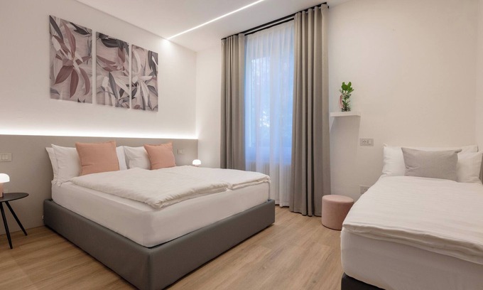 Trento Casa | Triple room consisting of double bed and single sofa bed