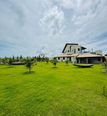 Coqueiro Casa | Triplex frente mar, com rooftop, piscina e jacuzzi!