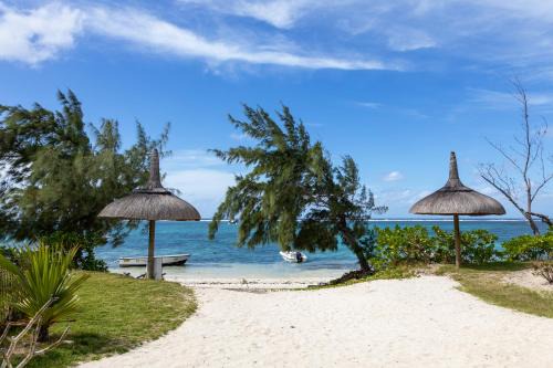 Belle Mare Apartamento | Tropical beachfront apartment